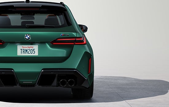 Rear shot of BMW M5 Touring showing the flared wheel arches. | BMW of Madison in Madison WI
