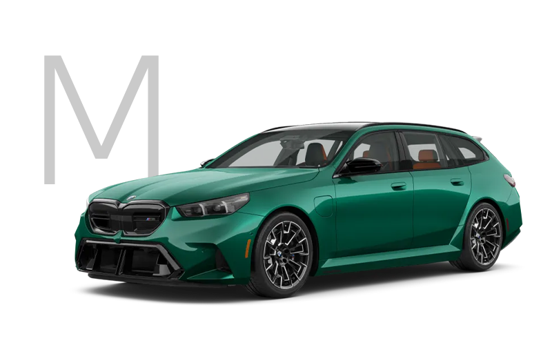 The new BMW M5 Touring in green with M logo. | BMW of Madison in Madison WI